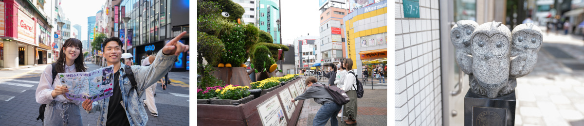 地図を手に街を歩く学生